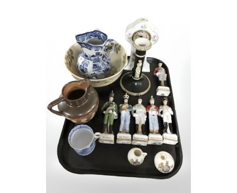 A group of ceramic soldier figurines, West German porcelain timepiece, candlestick, Royal Doulton jug, etc.