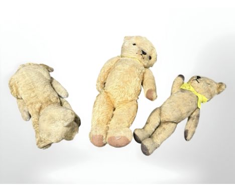 Two vintage jointed mohair teddybears and a further dog, largest 41 cm long.
