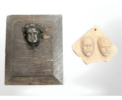 An 18th century Flemish carved oak plaque, 25 cm x 20 cm, and a George V and Queen Mary terracotta Corination tile fragment.