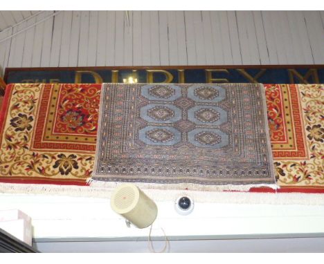 Red ground Belgian wool carpet 3.40 x 2.50 and pale blue ground Persian design rug 1.85 x 1.26 (2)