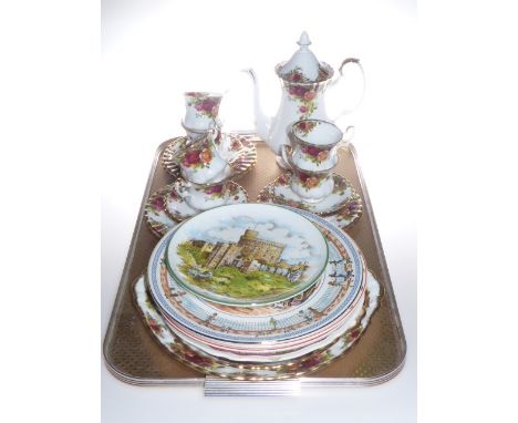 Six Royal Albert Country Roses cups, saucers and plates, coffee pot and two cake plates, two calendar plates, etc