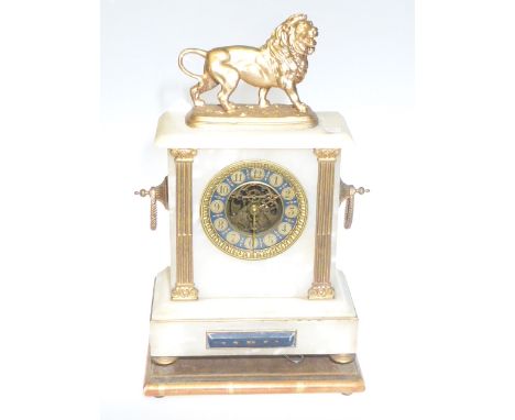 19th Century onyx and ormolu mantel clock mounted with lion, having open movement and enamel painted dial