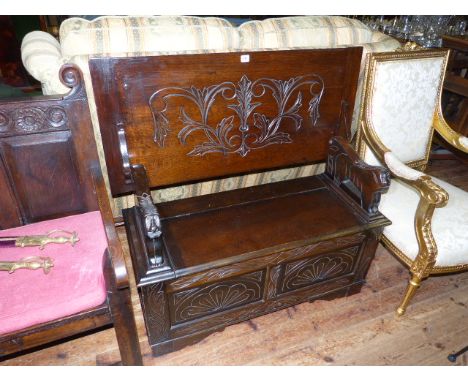 Carved oak monks bench