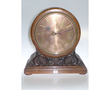 Large carved oak cased bracket clock raised on four bun feet having double fusee movement, 51cm high