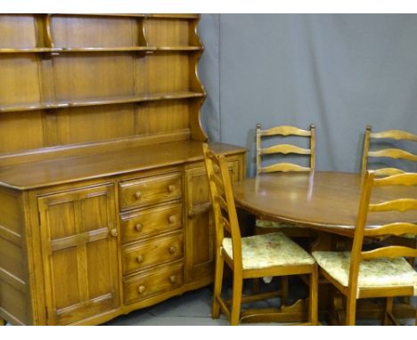 A MID TO LATE TWENTIETH CENTURY ERCOL DINING SUITE of dresser, circular dining table and four ladder back chairs, 171cms heig