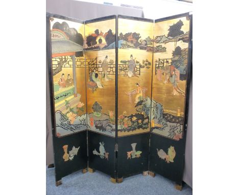 A VINTAGE JAPANESE FOUR-FOLD DRESSING SCREEN, typical colourful decoration relief with a gilt background, the rear side decor
