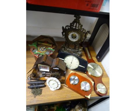 A CUCKOO CLOCK, Metamec retro mantel clock and a parcel of other clocks and barometers