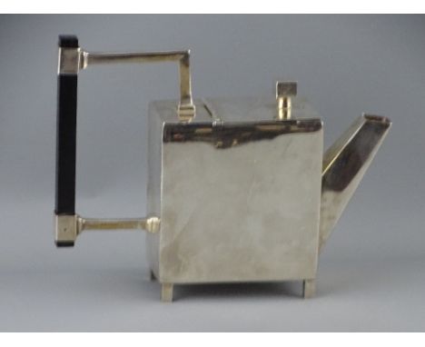 A STYLISH CUBIST FORM TEAPOT DESIGNED BY DR CHRISTOPHER DRESSER, white metal with ebonized handle, stamped to the base, 'Desi