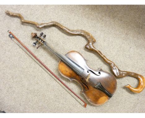 AN OLD VIOLIN AND BOW with mother of pearl detail and a crooked walking stick