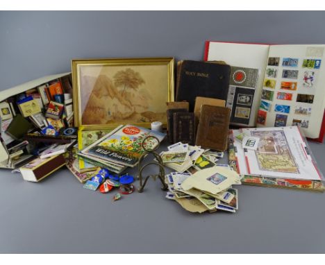 A MIXED GROUP OF COLLECTABLES to include a small early framed watercolour painting, postage stamps, book match collection, bu
