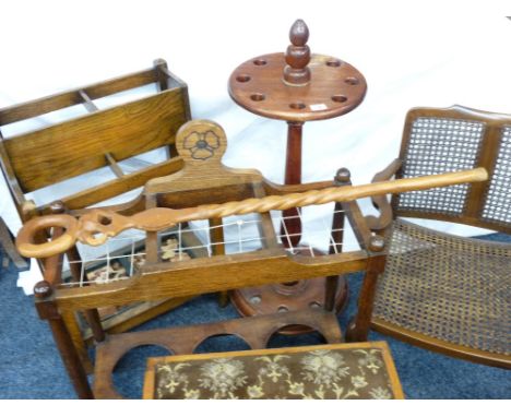 TWO VINTAGE OAK STICK STANDS, a mahogany billiard cue stand, a cane work elbow chair and an upholstered topped foot stool ETC