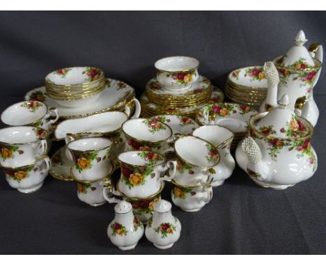 SIXTY FIVE PIECES OF ROYAL ALBERT 'OLD COUNTRY ROSES' TABLEWARE to include lidded tea and hot water pots and 26.25cm dinner p