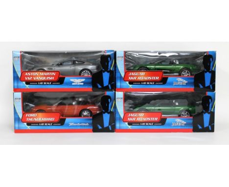 A group of four 1/18 scale die cast replica models, all boxed, by Paul's Model Art GmbH, distributed by The Beanstalk Group, 