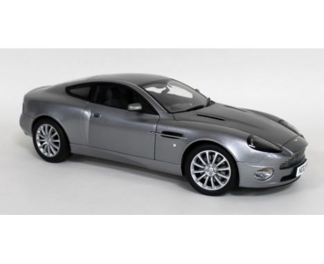 A 1/12 scale die cast and ABS plastic replica model Aston Martin V12 Vanquish, by Kyosho Corporation, Japan, No 08603S, as dr