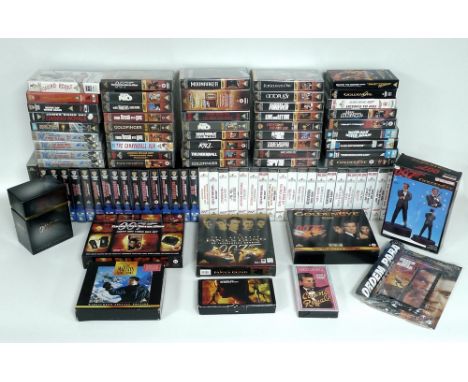 A collection of VHS tapes, including a live 1954 television adaptation of the novel 'Casino Royale' starring Barry Nelson, a 