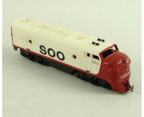 A collection of OO gauge engines and rolling stock, including a Palitoy 4-6-0 locomotive, a 0-6-0 locomotive (boxed), a Lima 