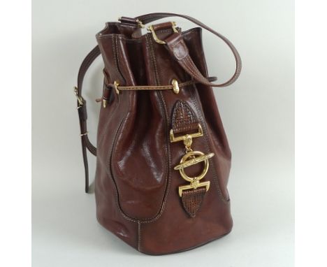 A collection of vintage handbags, including a Baldinini 1980's evening bag, Joan and David black bag, Tessier French drawer s