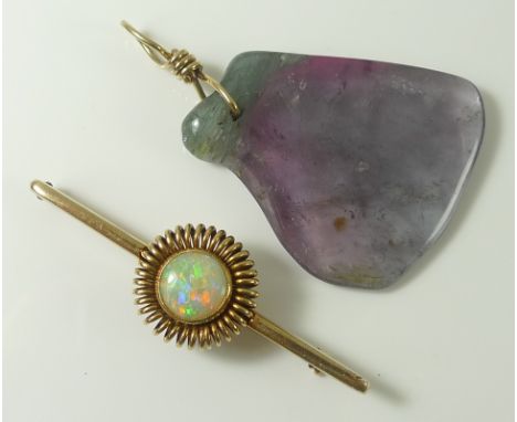 A 14ct gold bar brooch set with an opal surrounded by gold spring halo, opal 0.9mm diameter, marked 585 to back, 7.9g, 5.5cm 