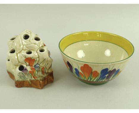 A Clarice Cliff Bizarre Crocus pattern bowl, marked with pattern name, 13.7 by 7cm, and a Crocus pattern flower rock, 9.5 by 