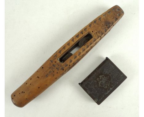 An early 19th century puzzle stick or rattle, possibly Napoleonic Prisoner of War, the stick carved with central compartment 