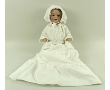 An Armand Marseille doll, stamped 'Armand Marseilles, Germany 996 A.13.M.', with sleeping blue glass eyes, opening mouth with