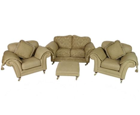 A modern three piece suite, comprising two seater sofa, two armchairs and footstool, the sofa with golden foliate patterned u