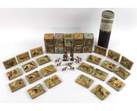 A group of vintage toys, comprising ten Edwardian wooden alphabet cube blocks, twenty two rectangular blocks, each with appli