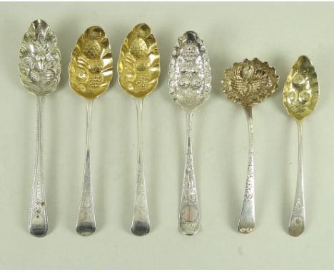 A group of six George III berry spoons, comprising a Peter, Ann and William Bateman spoon, with gilt bowl, London 1802, an un