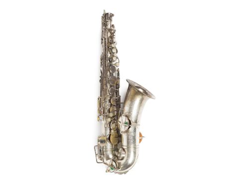 A True-Tone silver plated saxophone, no. 220567, in fitted case