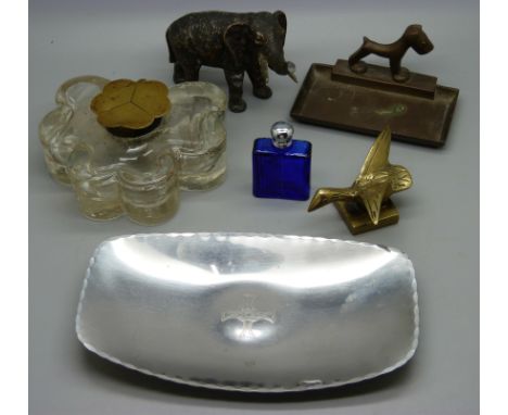 A Keswick School of Art dish, an inkwell, a model of an elephant, trunk a/f, etc. 