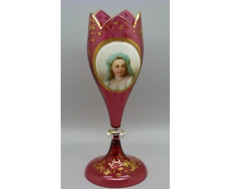 A circa 1900 cranberry glass vase with gilt decoration and portrait plaque, 20cm 