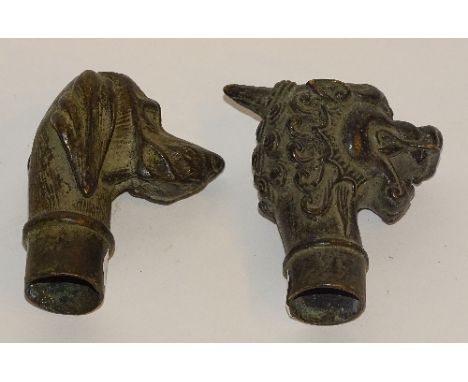 Two bronze effect walking stick heads, in the form of a gargoyle and spaniel dog (2)