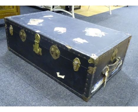 A vintage travel trunk, with old Cunard labels to top, 32cm high x 92cm wide