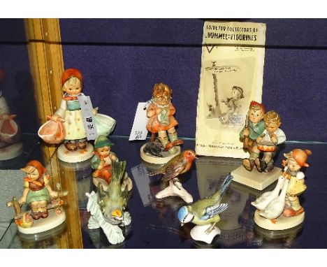 Six Hummel figures by Goebel, together with two Goebel bird ornaments and another similar (a/f) (9)