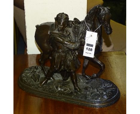 A cast bronze figure of a Cossack and horse, on naturalistic plinth base, horse tail lacking, 26cm high x 31cm wide