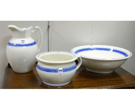 A blue and white pottery toilet set, comprising basin, ewer and chamber pot, jug 28cm high (3)