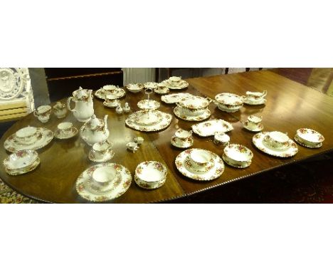 A Royal Albert 'Old Country Roses' six place dinner service, comprising of six dinner plates, six soup bowls on saucers, seve