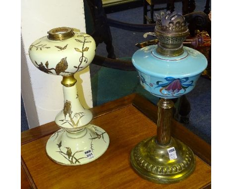 A vintage opaque glass oil lamp base by Hinks & Sons-Patent, decorated with gilded panels of birds on branches on pale yellow