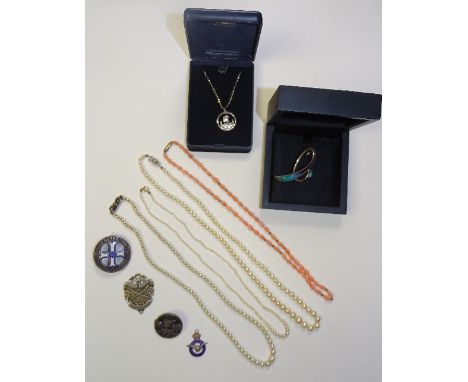 Three sets of graduated pearl necklaces, two with 9ct gold clasps and one with silver clasp, together with a coral necklace, 