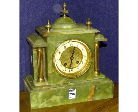 An onyx mantel clock, with cream enamel and gilded dial, 32cm high