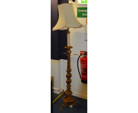 A Louis XVI style gilt gesso floor lamp, converted to electricity, with shade