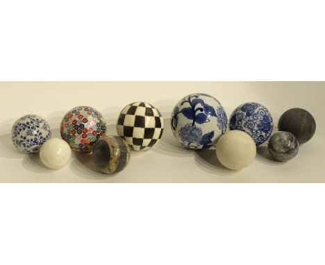 A mixed lot of Victorian style ceramic and marble effect carpet bowls, of various sizes (10)