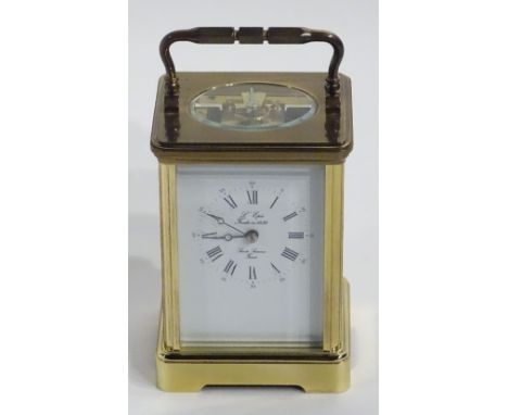 A French brass carriage clock signed L'Epee to the dial, the white enamel dial with Roman numerals and Arabic minute track, s