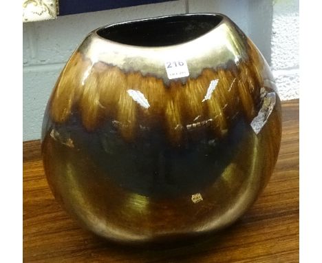 A Poole pottery 'Precious' design 28cm purse vase, in the Ruskin style on glazed brown ground