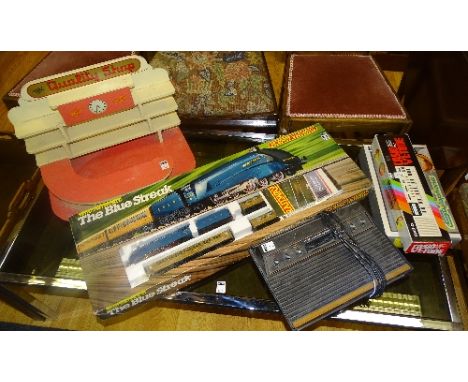 A vintage 1980's boxed Hornby Railways 'The Blue Streak' electric train set, including five part train, track and power suppl