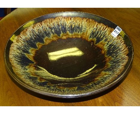 A Poole pottery 'Precious' design bowl, in the Ruskin style on glazed brown ground, 35cm diameter