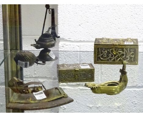 A collection of Eastern brasswares, to include two Persian style boxes, a lime container, two small crusie oil lamps and Tibe
