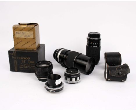 A Tamron Zoom lens together with other 33m camera lenses 