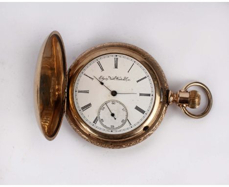 A 14k gold full hunter pocket watch with engine turned case and crown wind movement by Elgin watch Company . 117g gross. 