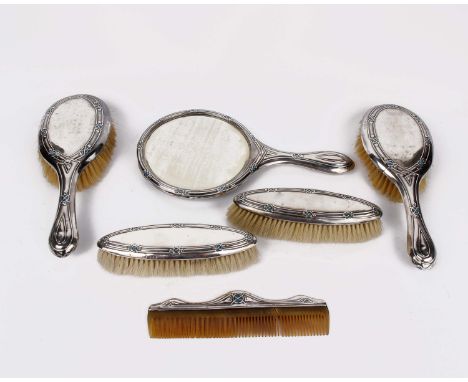 An Art Nouveau  six piece sterling silver and enamel dressing table set in the manner of Liberty &amp; Co by William Hair Has